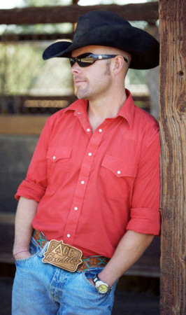 Western dude with large belt buckle